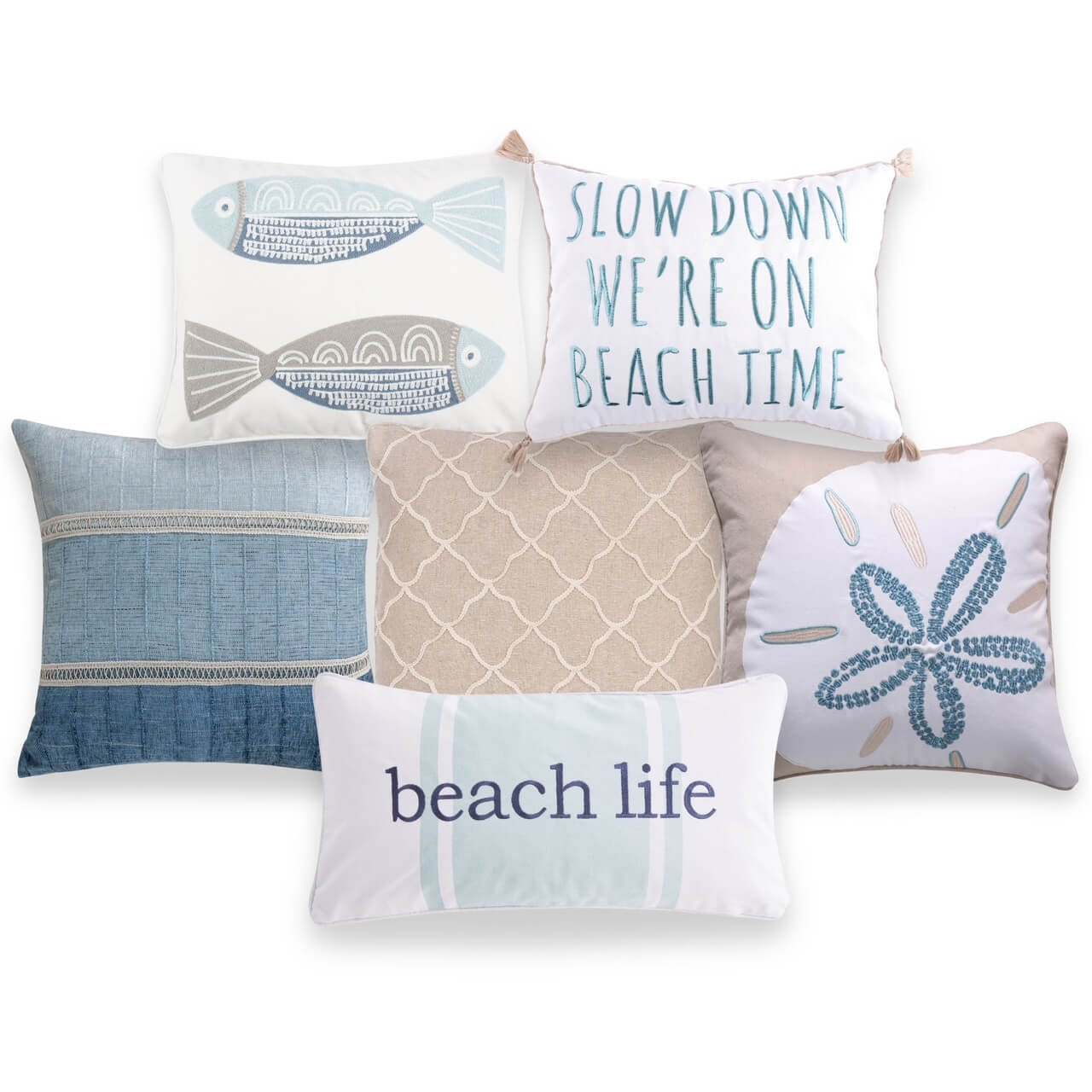 A collection of seven decorative pillows with various beach and ocean-themed designs, including fish and beach phrases, in shades of blue, beige, white, and green.
