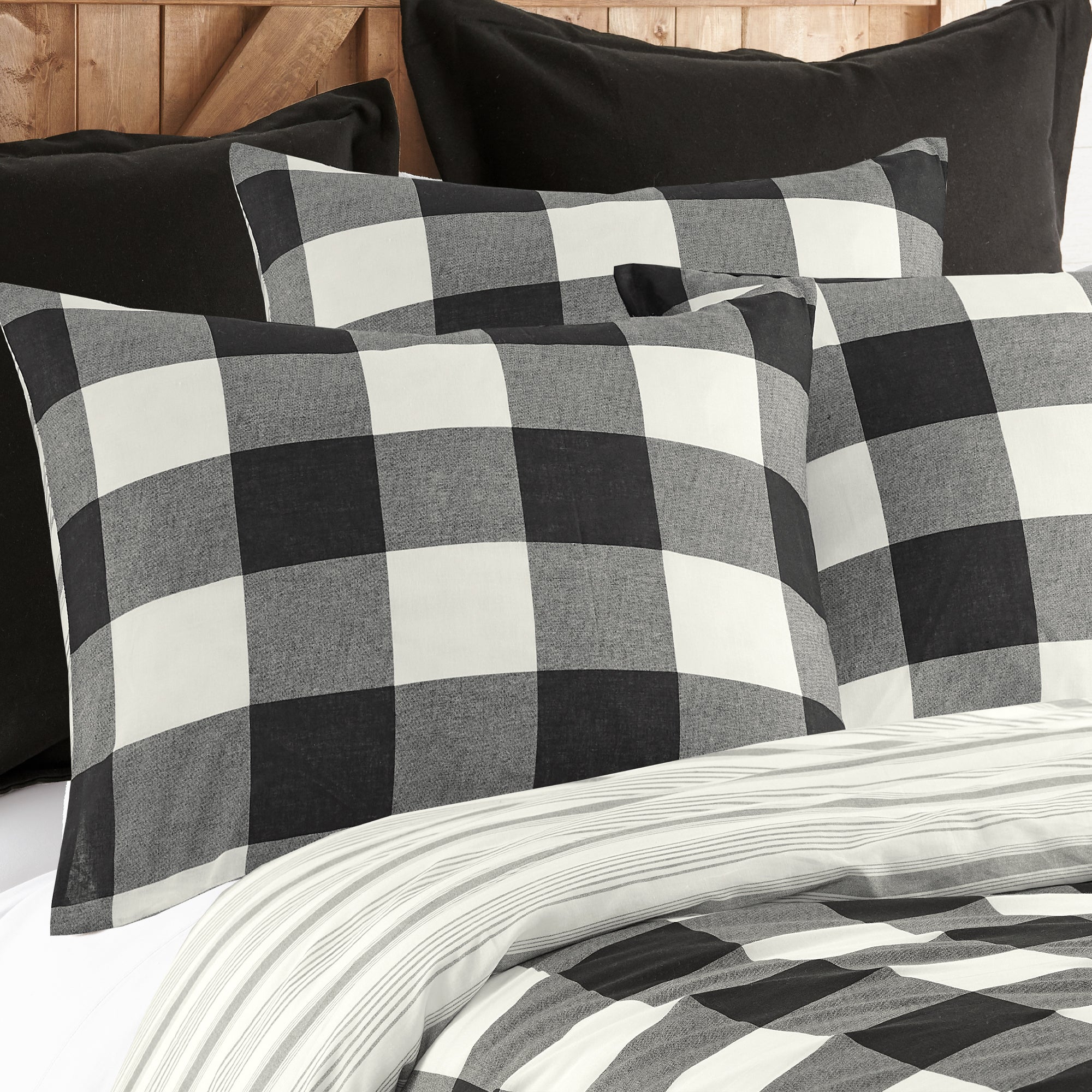 Camden Comforter Set featuring reversible comforter and buffalo check design with coordinating stripe, showcasing cotton details.