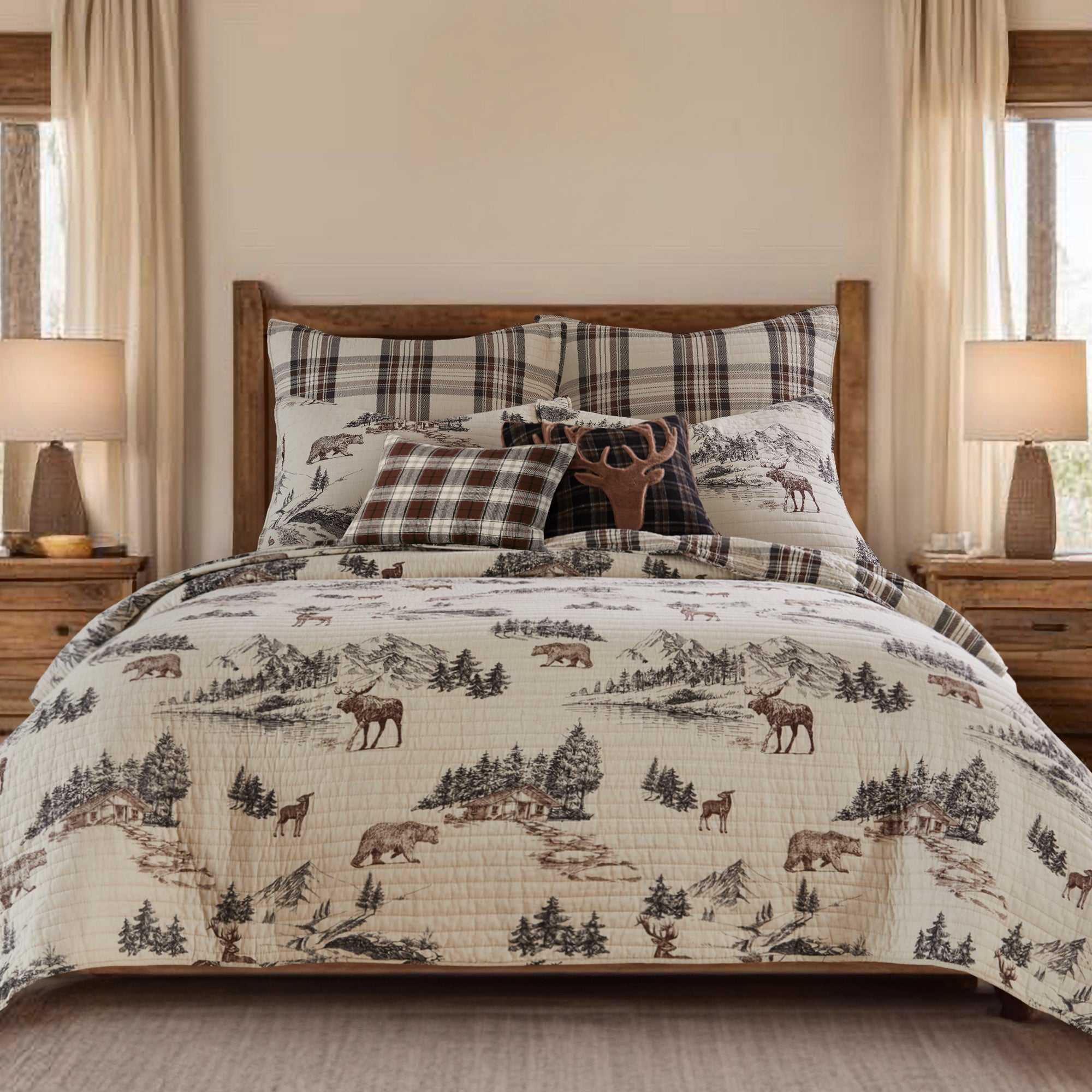 Bedding set with nature-themed design on a bed in a bedroom setting.