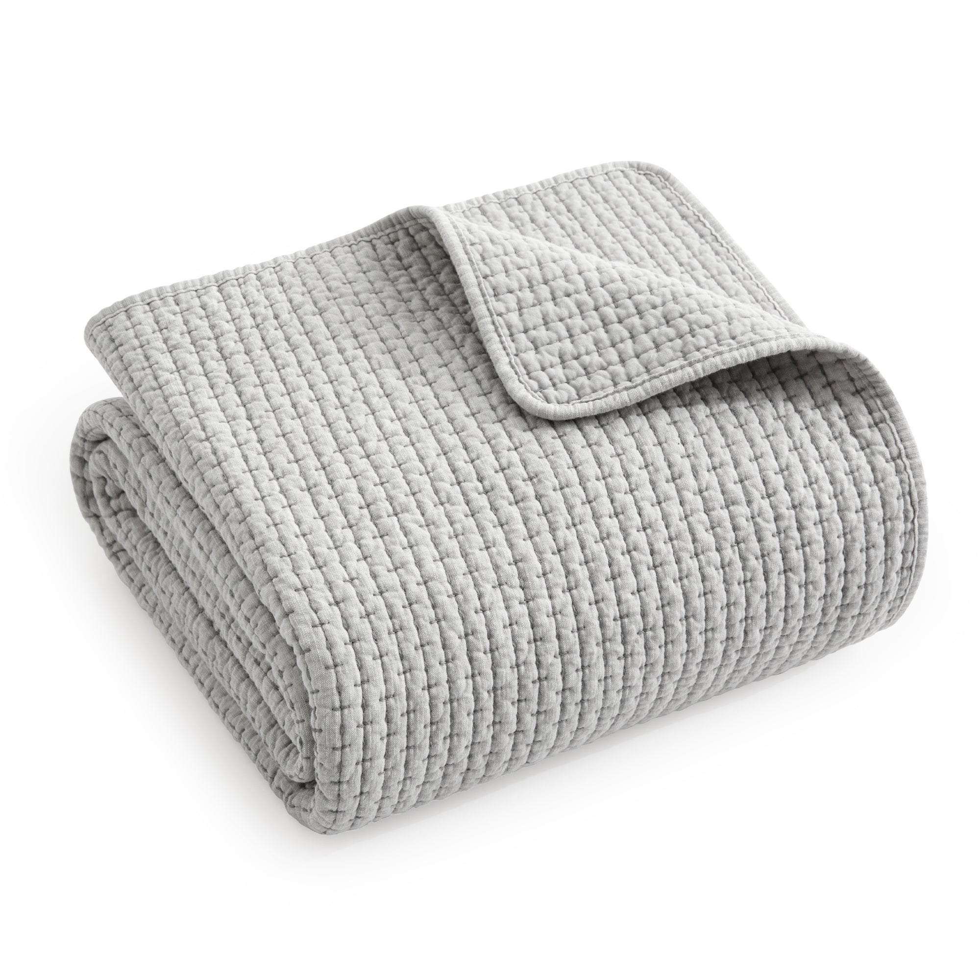 Pick-Stitch Artisan Quilted Throw folded in a cozy light gray, showcasing its quilted texture and pick-stitch detailing.