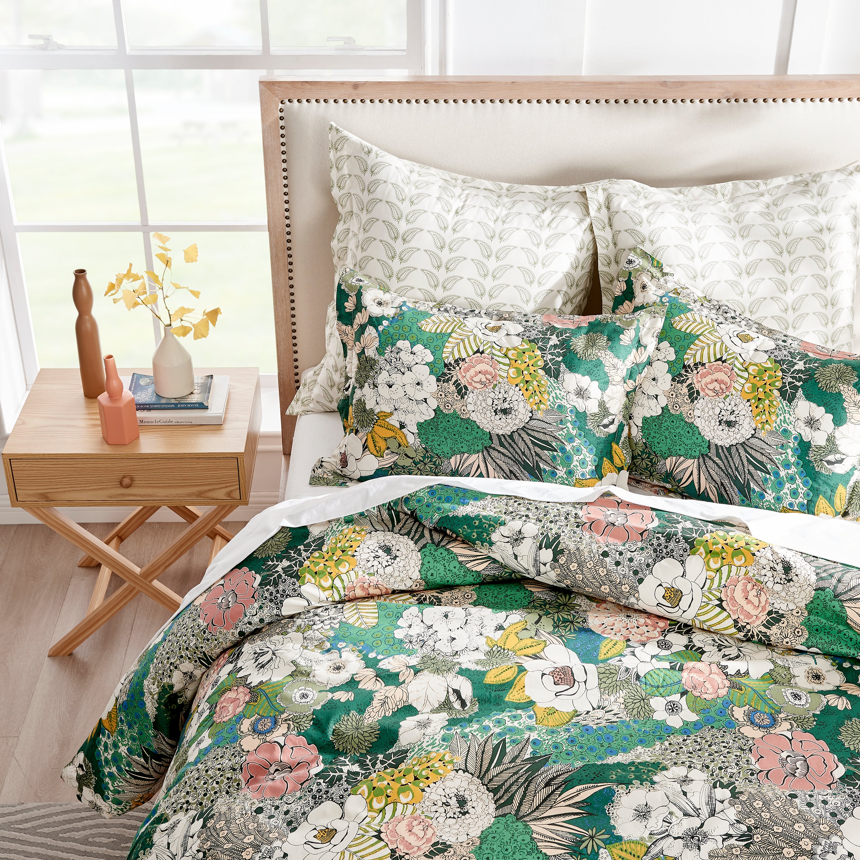 Bed featuring floral bedding set 