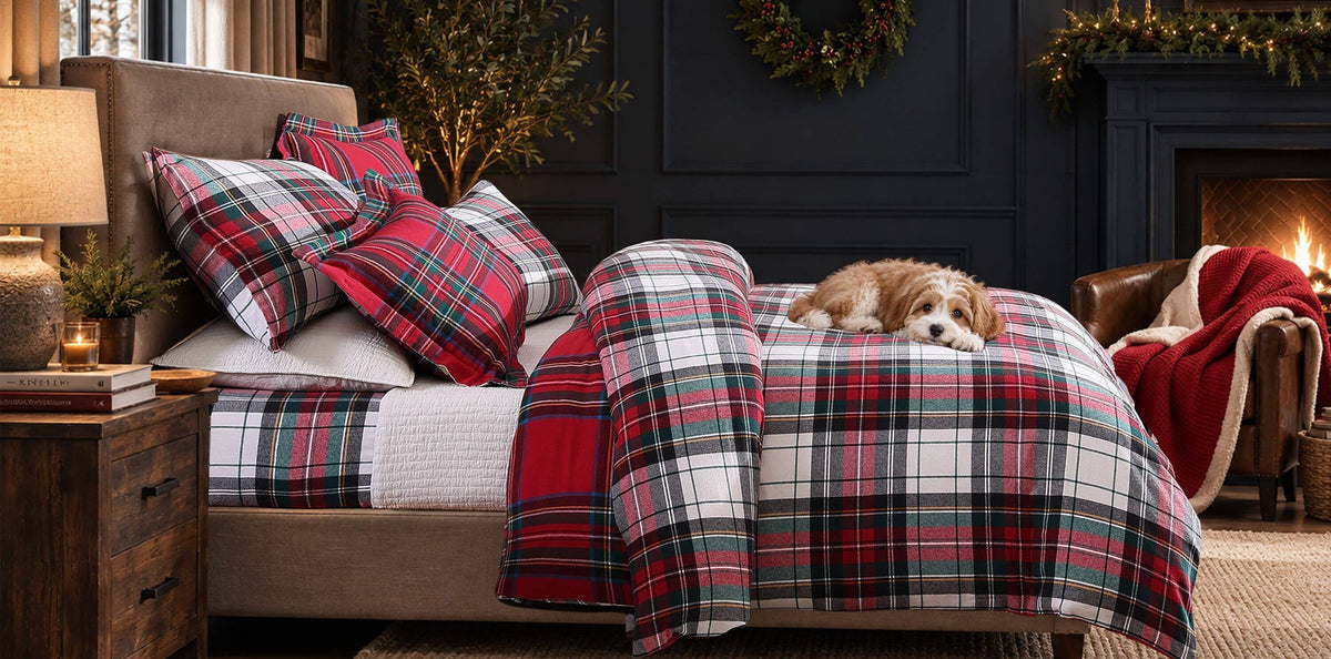 Christmas bedding with red and green plaid duvet cover set, festive pillows, and dog on bed