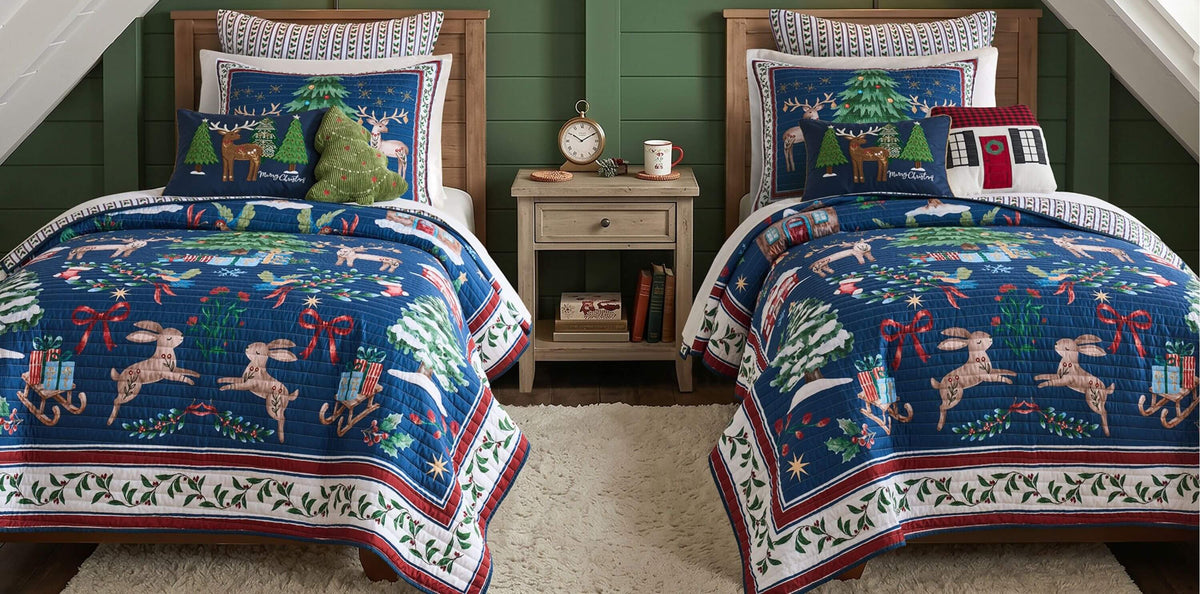 Christmas twin bedding with blue holiday quilt sets, reindeer, trees, and festive pillows