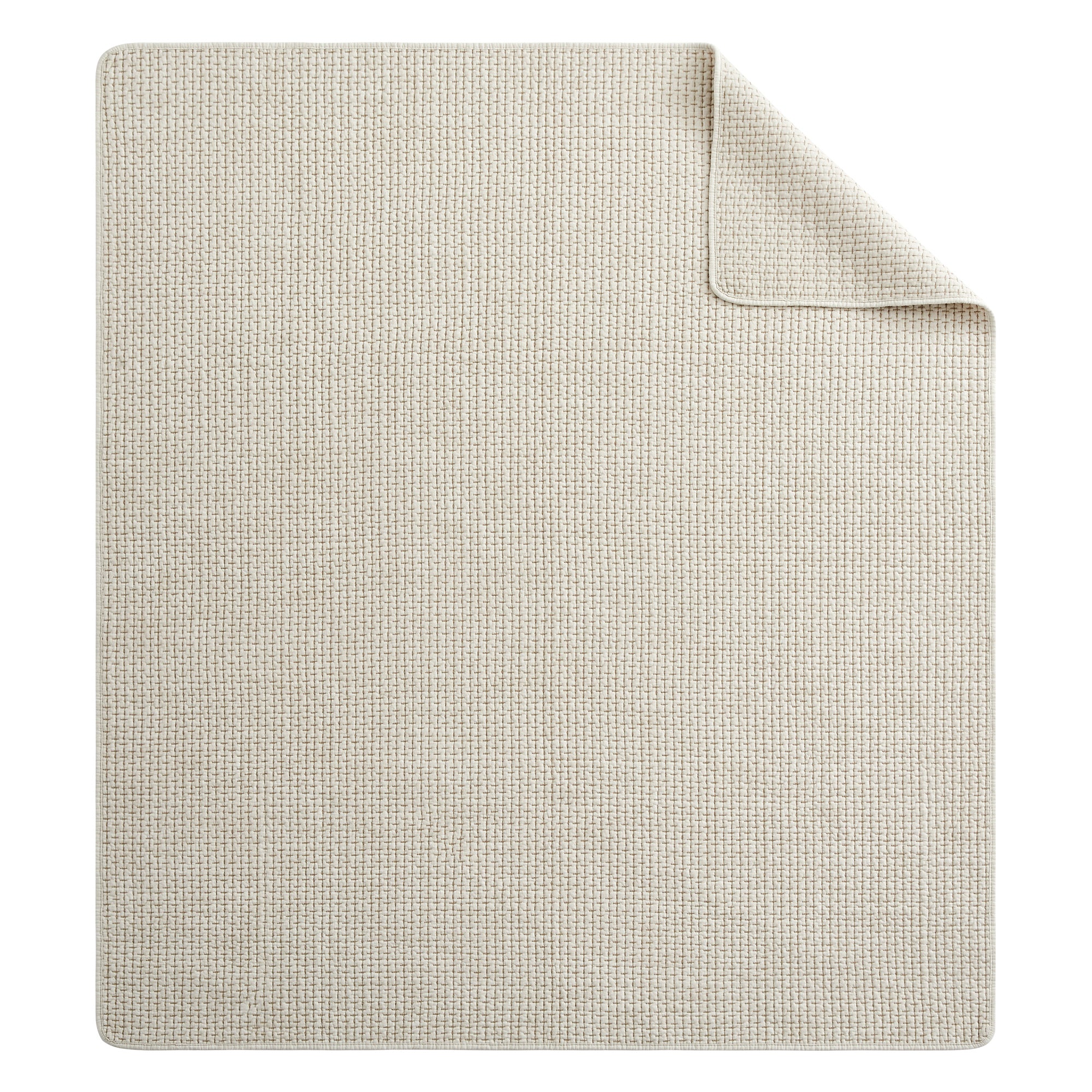 Pick-Stitch Artisan Quilted Throw in a light, textured fabric, showcasing the reversible design and pick-stitch detailing.