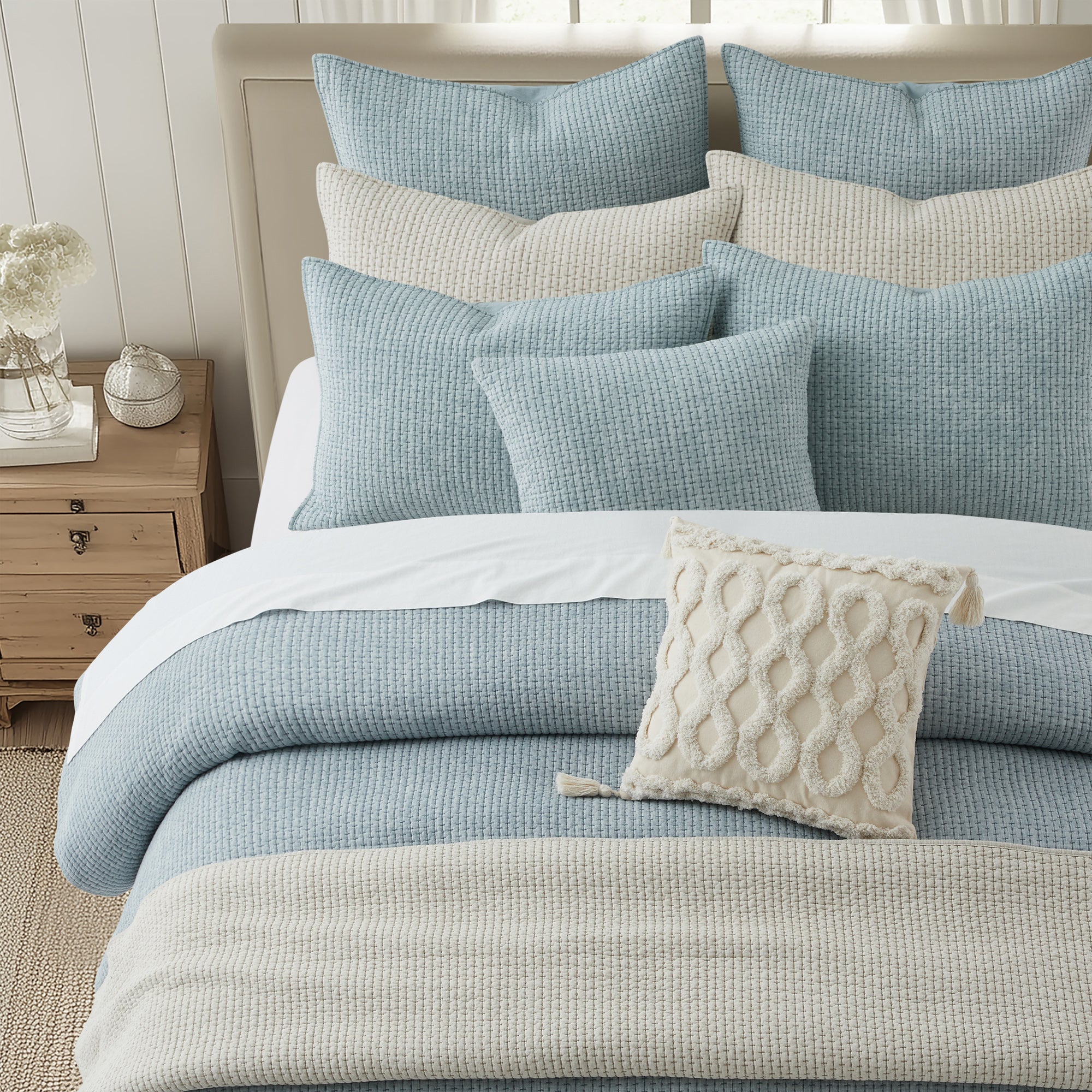Pick-Stitch Artisan Euro Sham Set of 2 in blue and cream with textured pillows and cozy bedding arrangement.