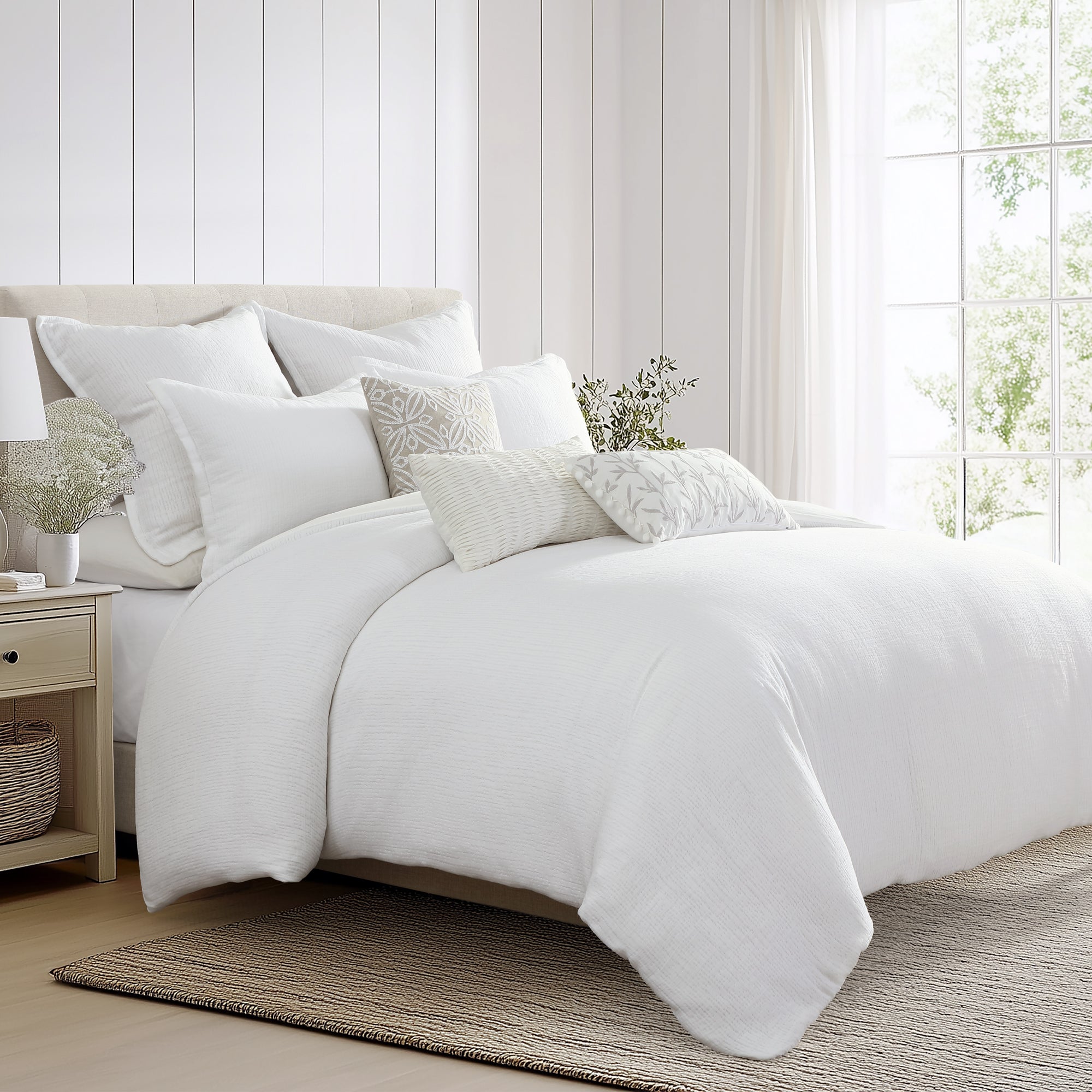 Cotton Tencel Matelasse Comforter Set in a contemporary bedroom, featuring white bedding and decorative pillows.