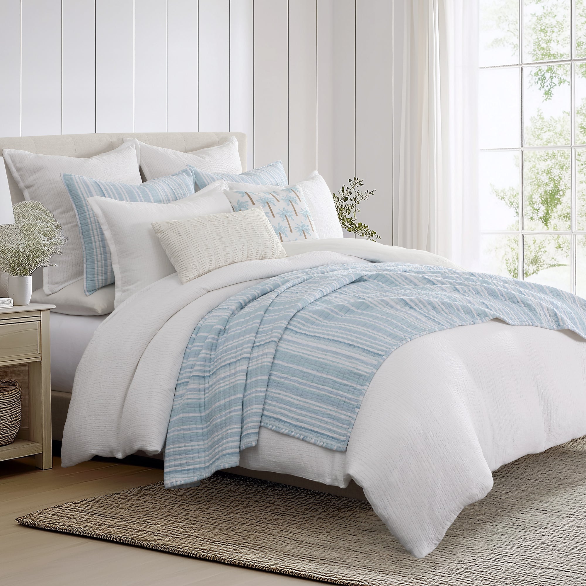 Cotton Tencel Matelasse Comforter Set in a serene bedroom with light blue accents and textured white bedding.