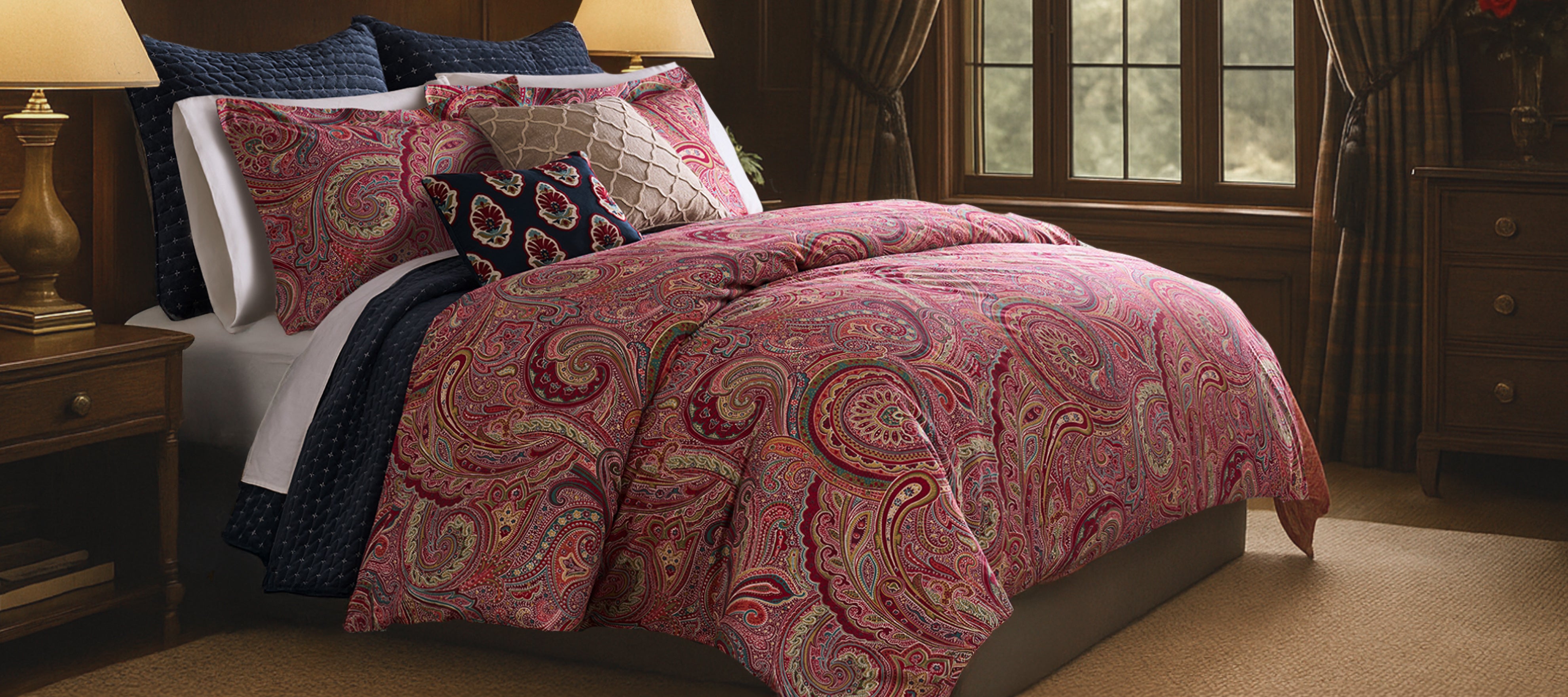 Bedroom with Spruce duvet cover set  with paisley pattern and decorative pillows  by Levtex Home on a bed