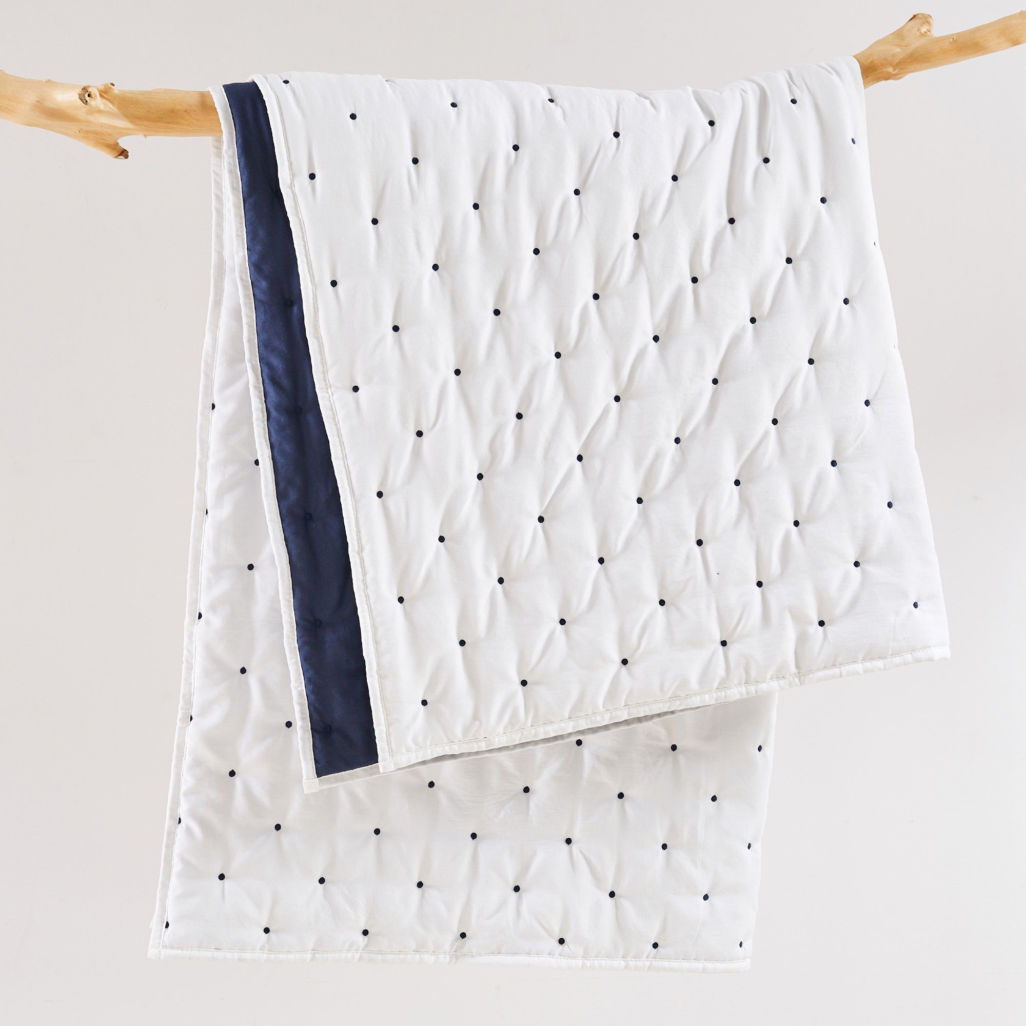 Embroidered Swiss Dot Navy Quilted Throw